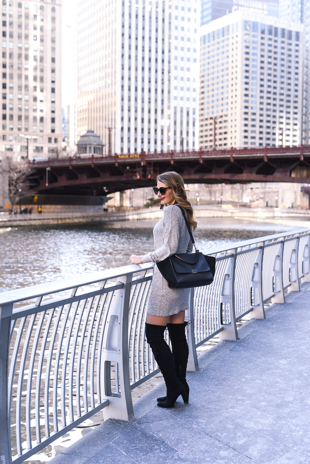 grey topshop dress with black over the knee boots and a celine trapeze bag