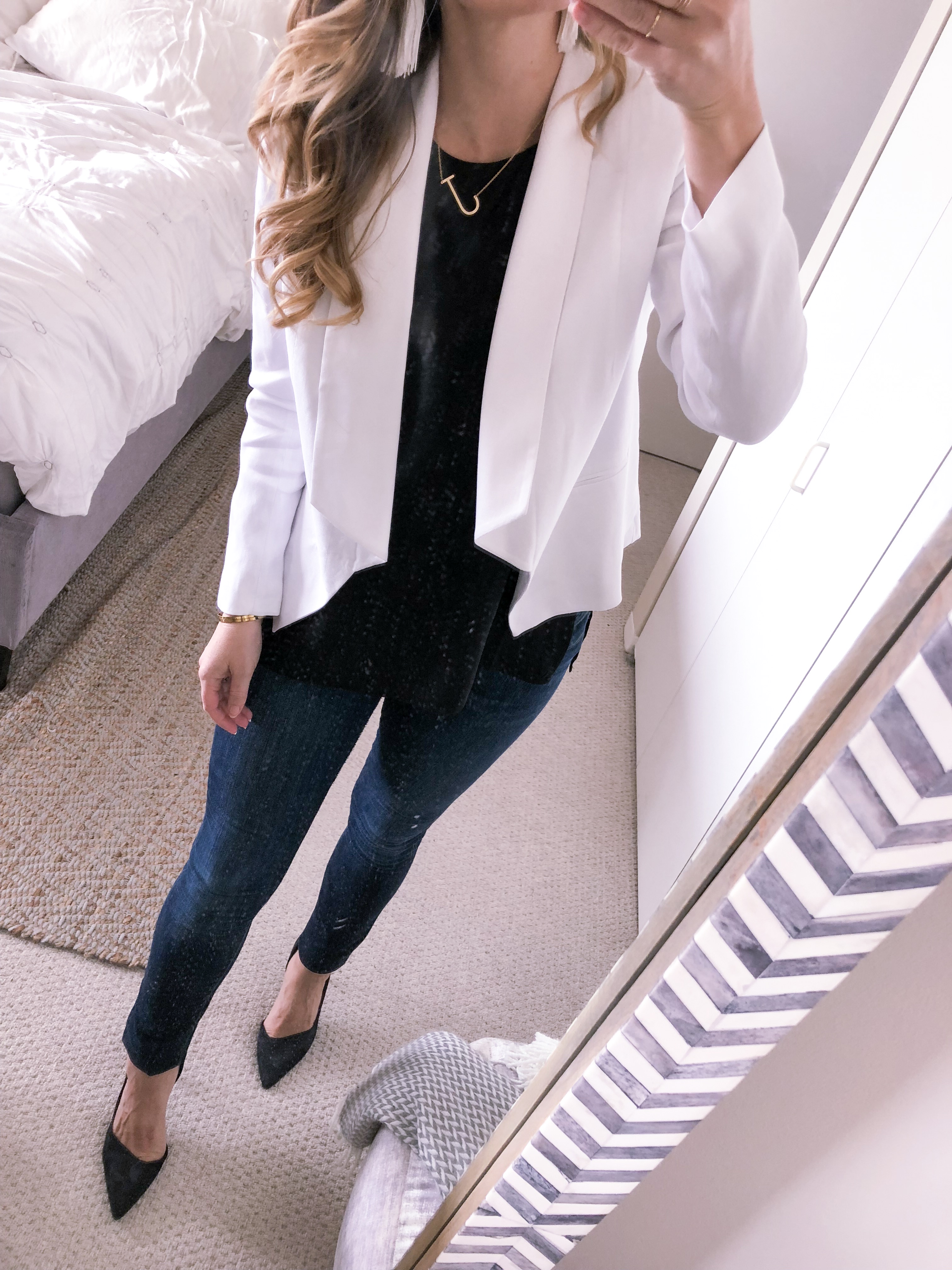 white blazer and black tank top