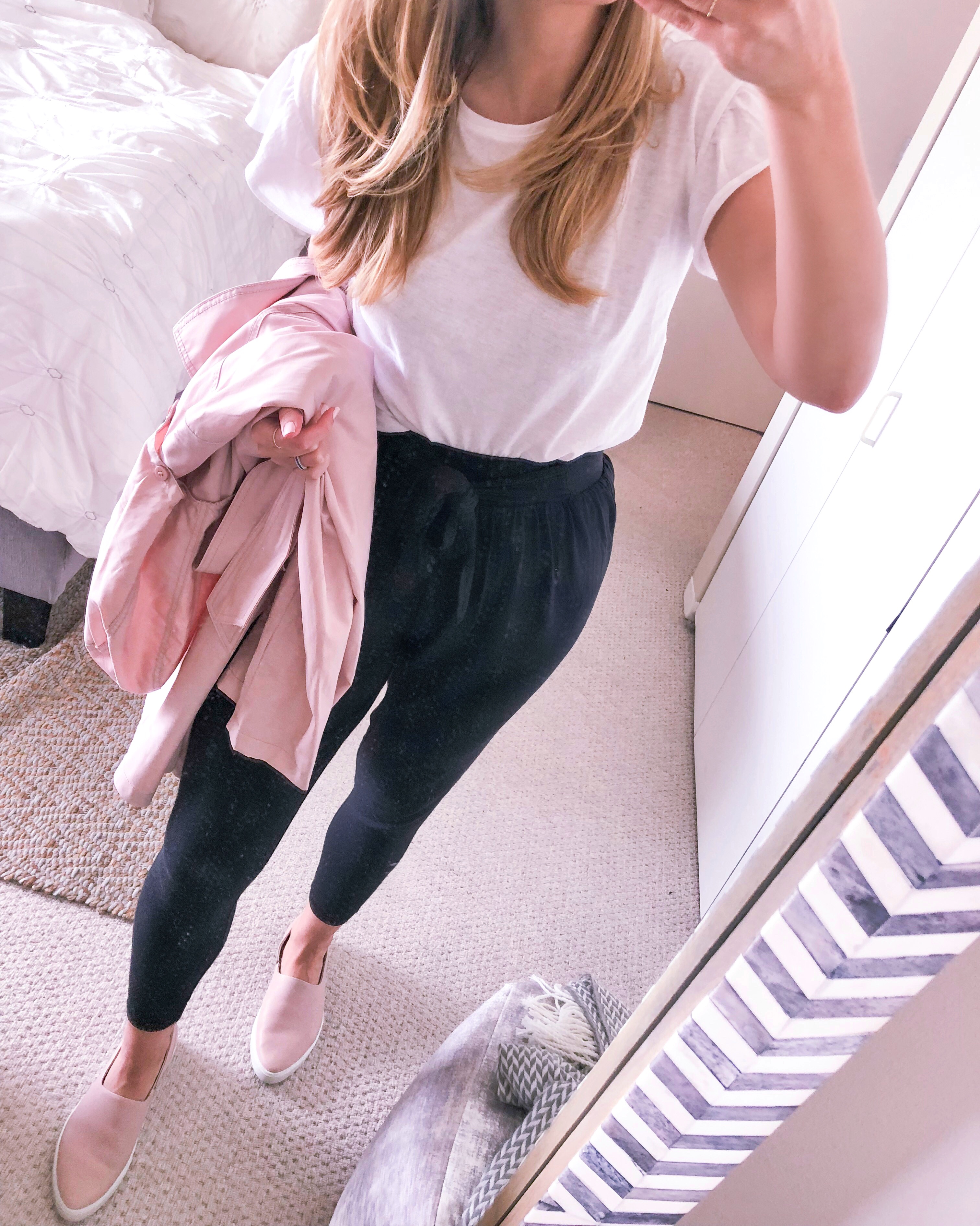 Black harem pants with a white tee and pink sneakers