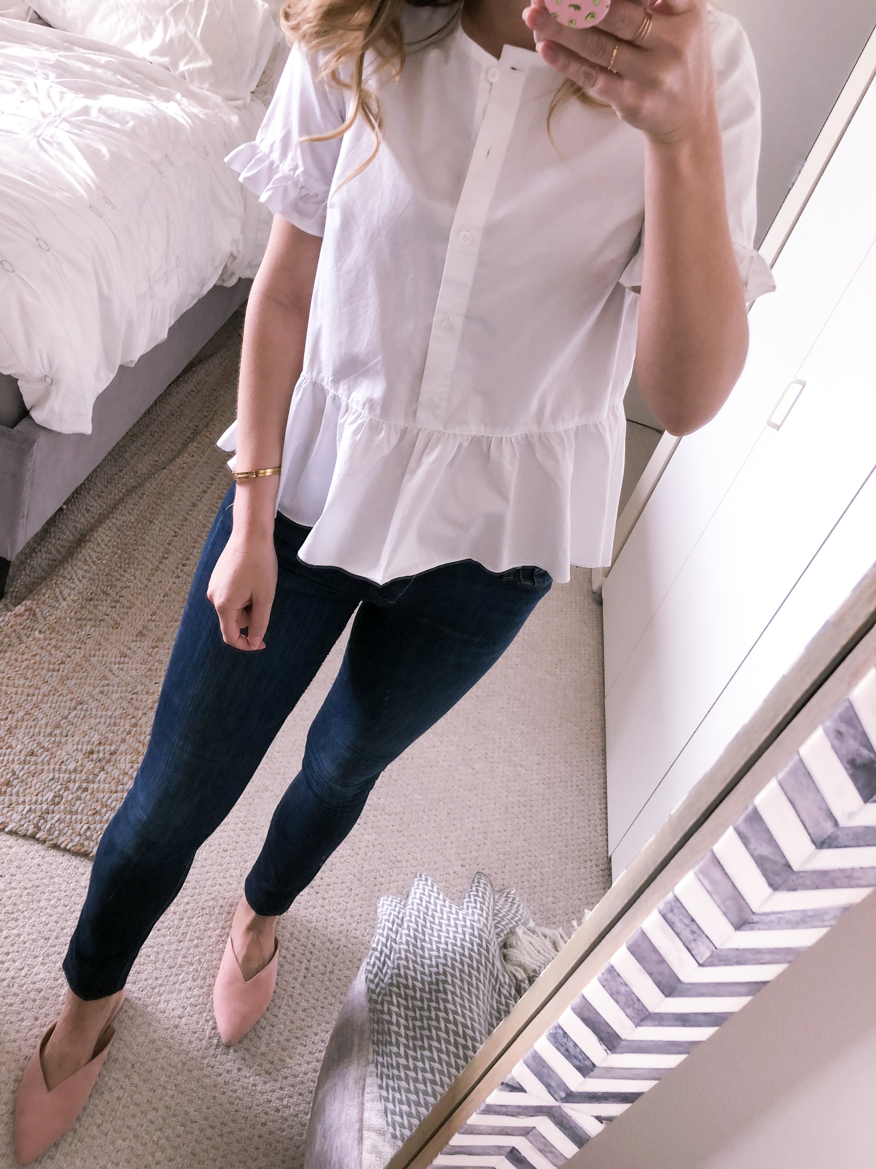 white ruffled blouse