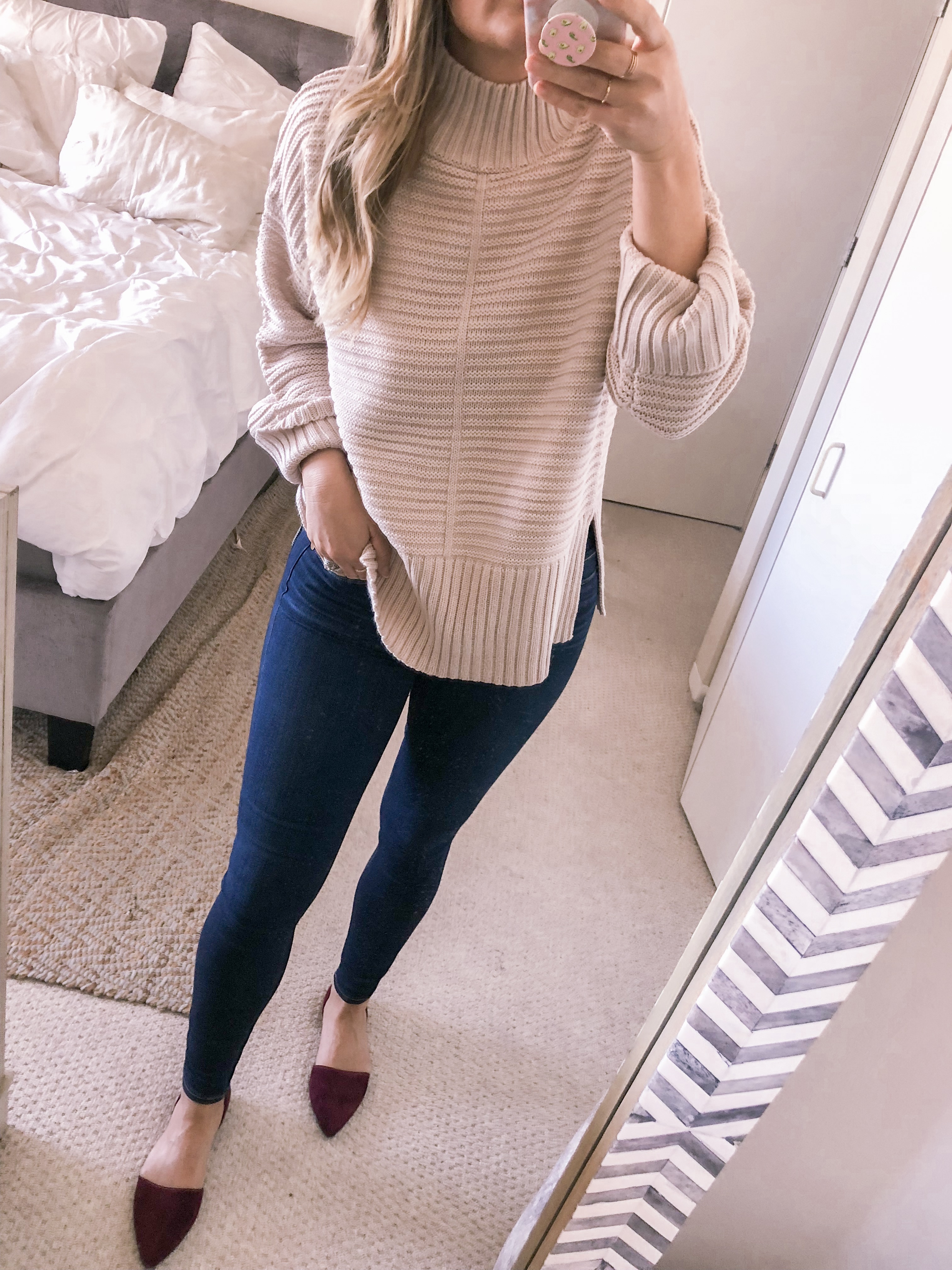 Chicago style blogger Visions of Vogue wears a Topshop turtleneck sweater with burgundy flats for a fall outfit idea. 