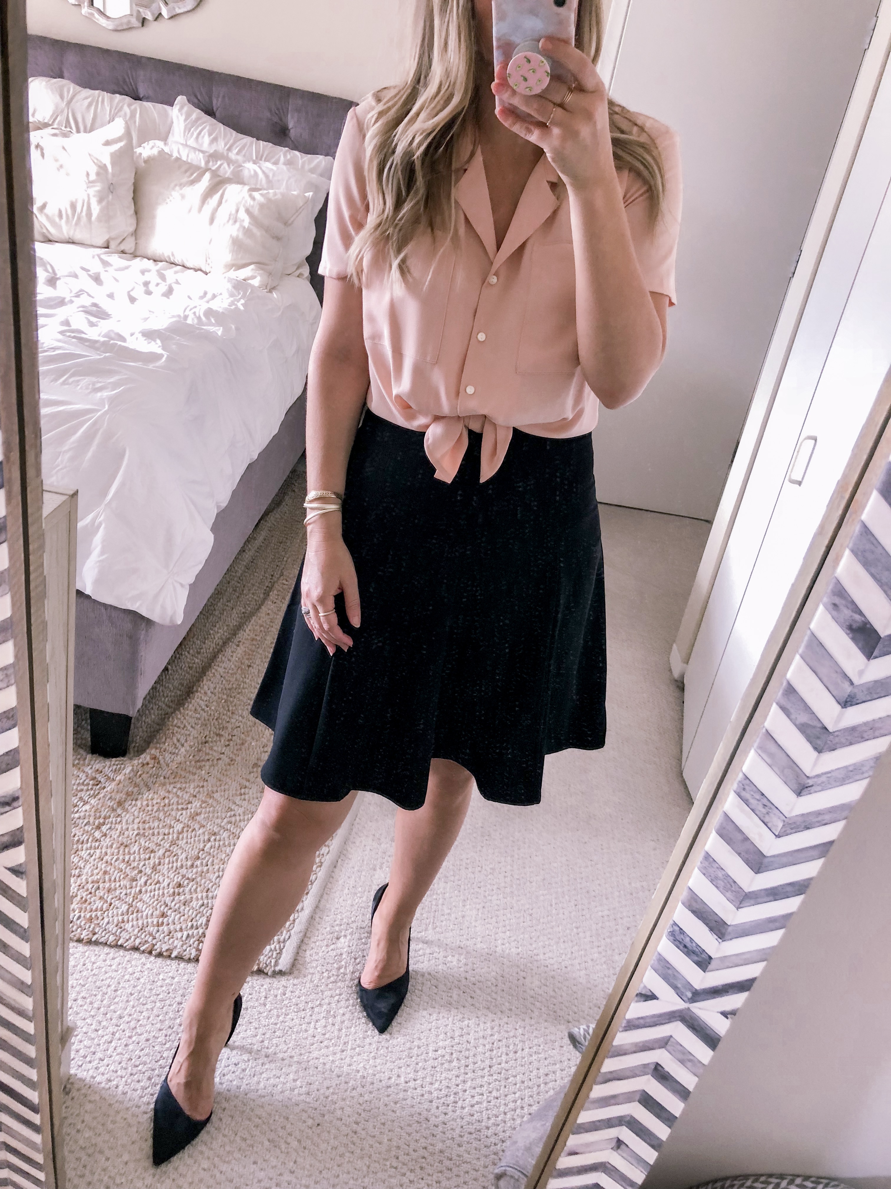 Chicago fashion blogger Visions of Vogue wears a CeCe Black Crepe Skirt with a Blush Pink button down shirt from Nordstrom for an office outfit idea.