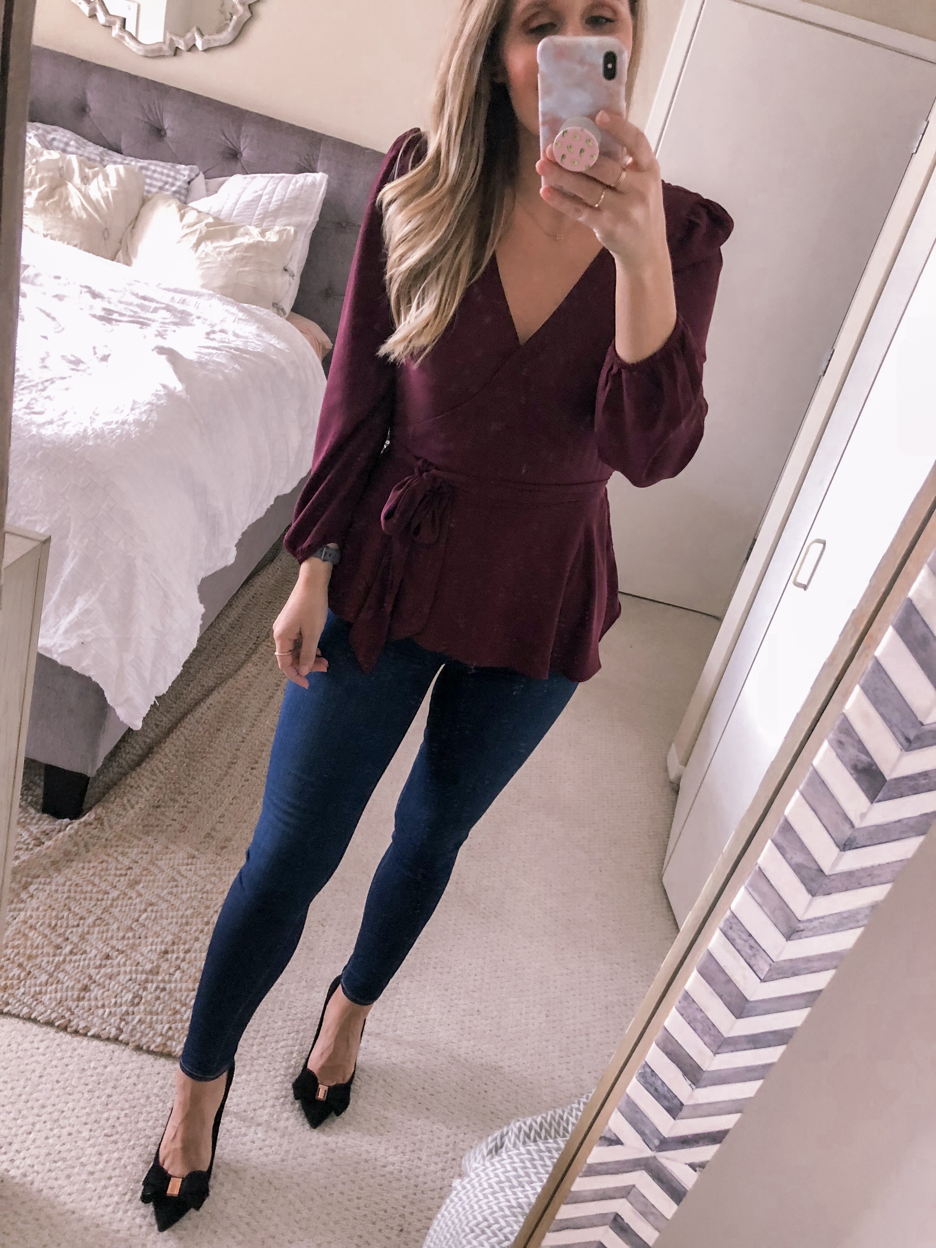 Chicago fashion blogger Visions of Vogue styles a LOFT burgundy wrap top for the office as a work outfit idea.