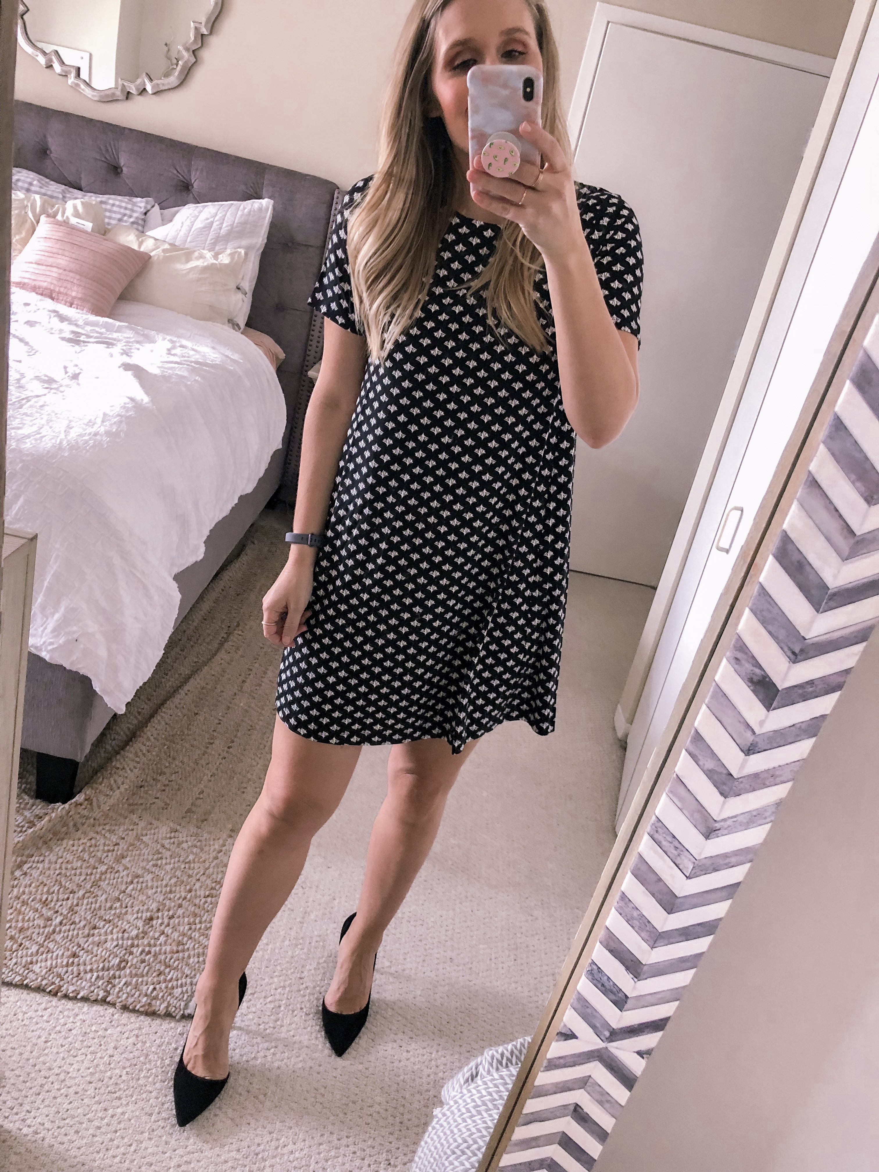 Chicago fashion blogger Visions of Vogue styles a black printed LOFT shift dress with black suede pumps for a work outfit idea.