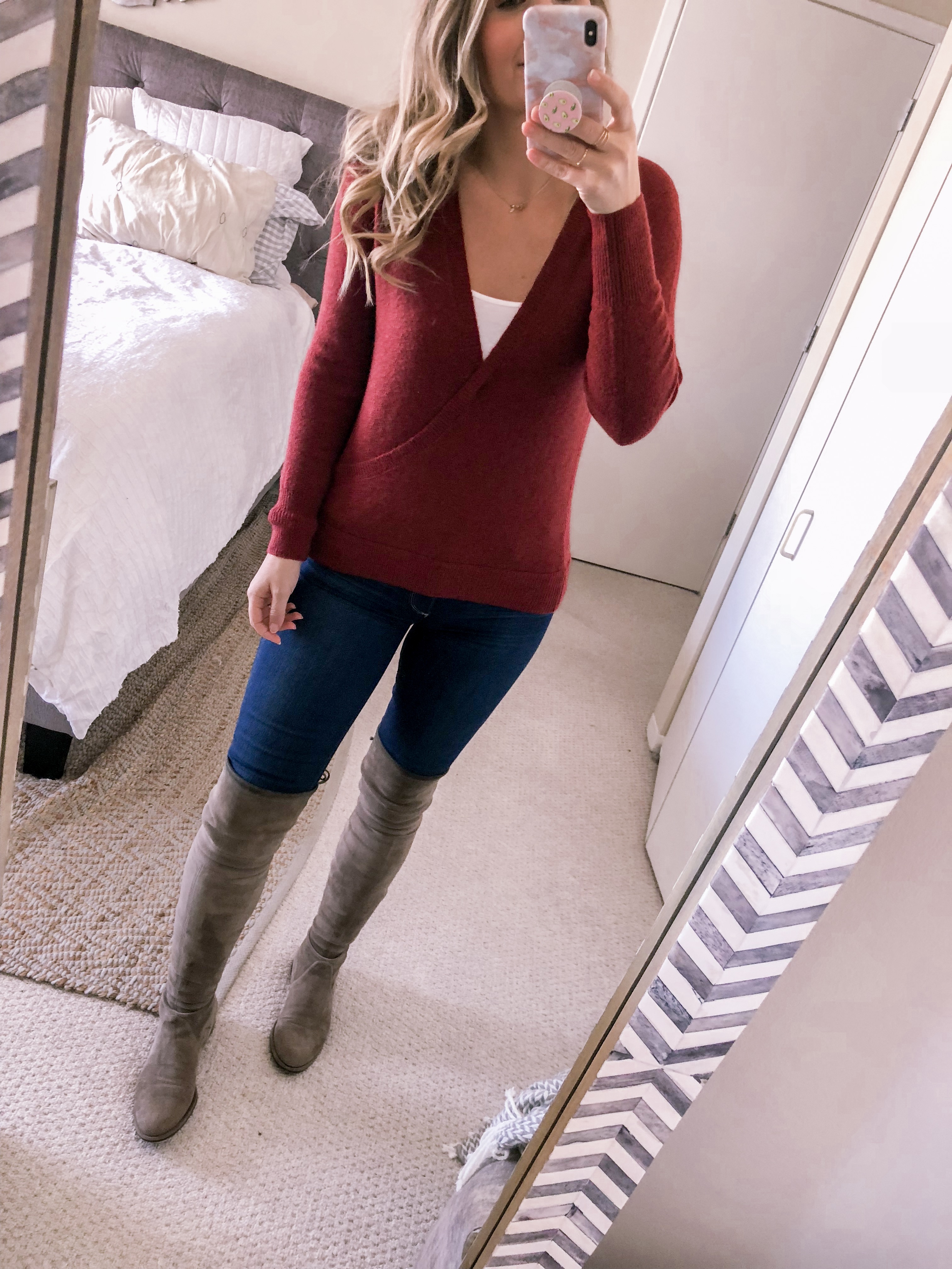 Jenna Colgrove, Chicago fashion blogger, wears a burgundy wrap sweater by Madewell from Norstrom with Stuart Weitzman over the knee suede boots for a fall work outfit idea for the office.