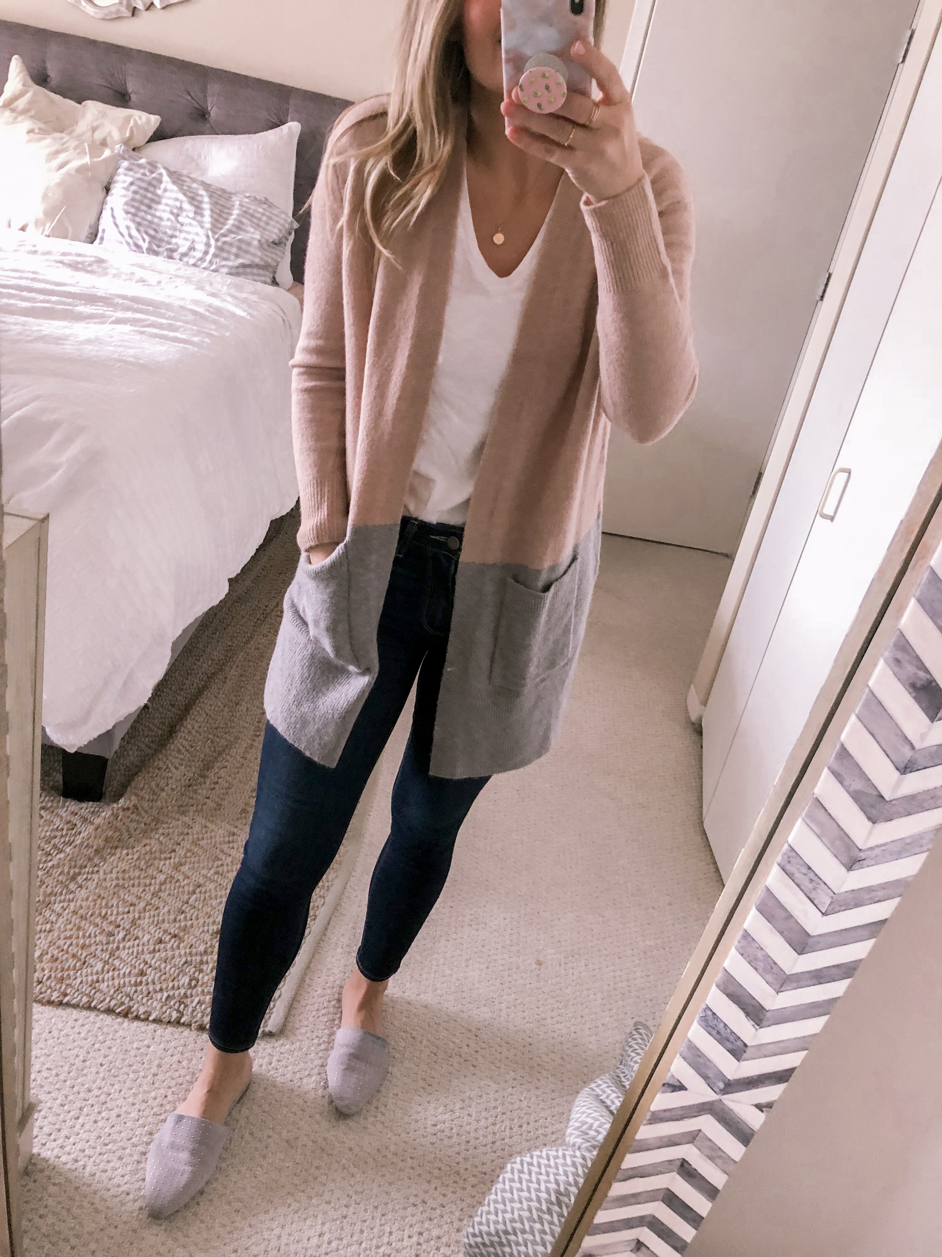 Popular Chicago fashion blogger Visions of Vogue styles the Madewell colorblock cardigan with the Whisper Tee for a casual office outfit idea.
