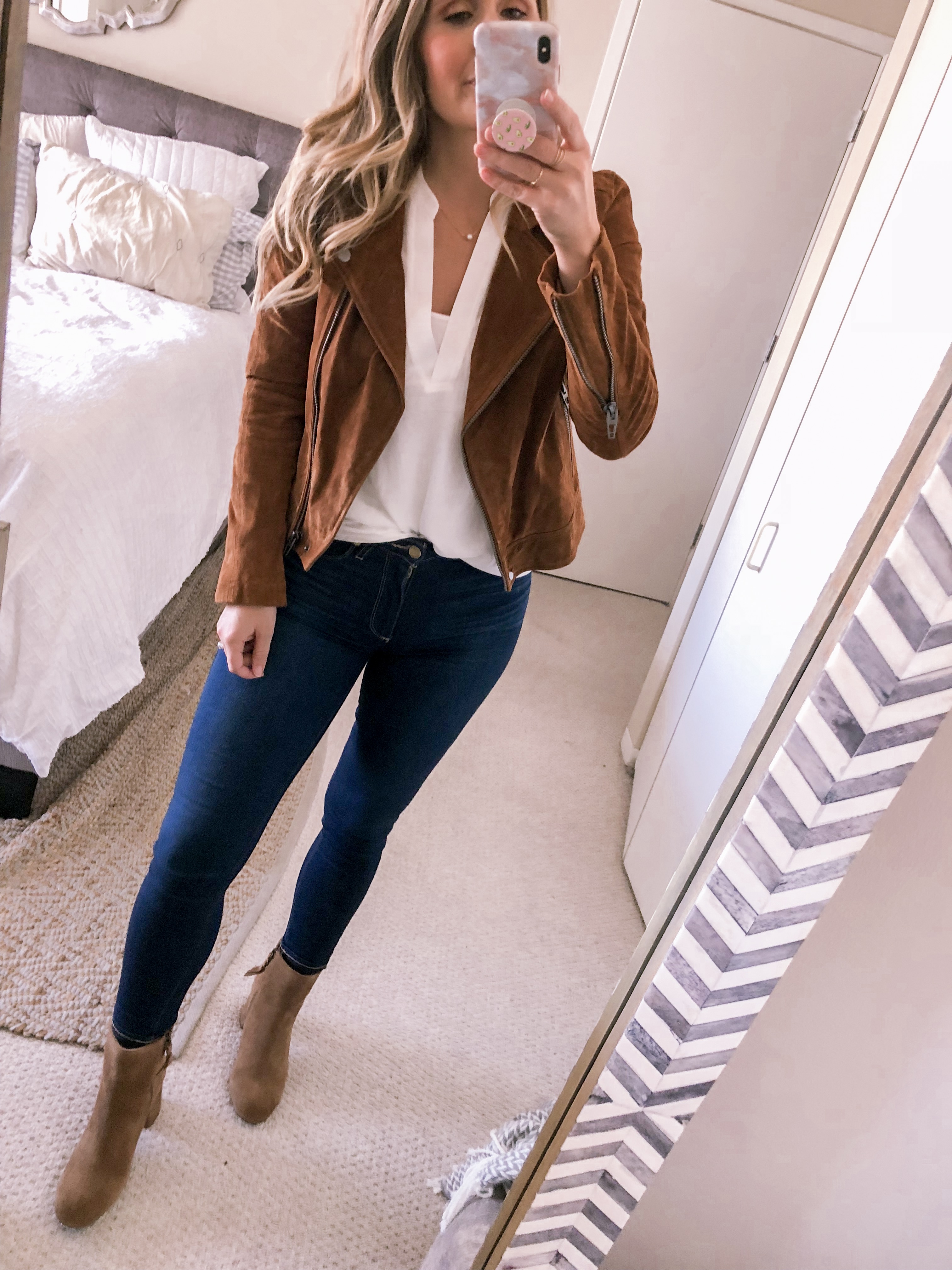 Chicago fashion blogger wears a suede moto jacket with a white blouse for under $25 for a casual weekend outfit.