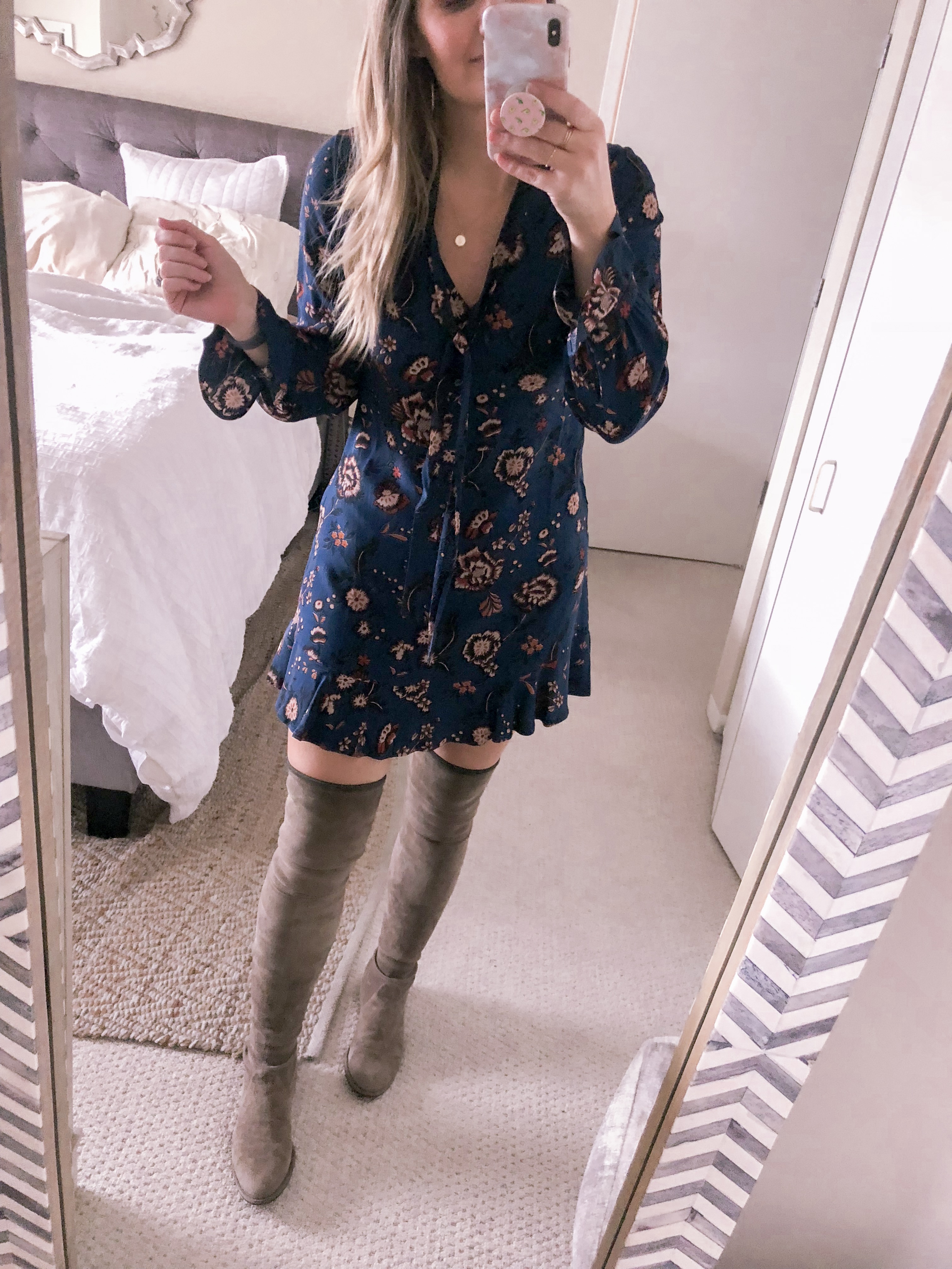 Chicago fashion blogger Visions of Vogue styles a navy floral dress with taupe over the knee boots for work to weekend outfit inspiration.