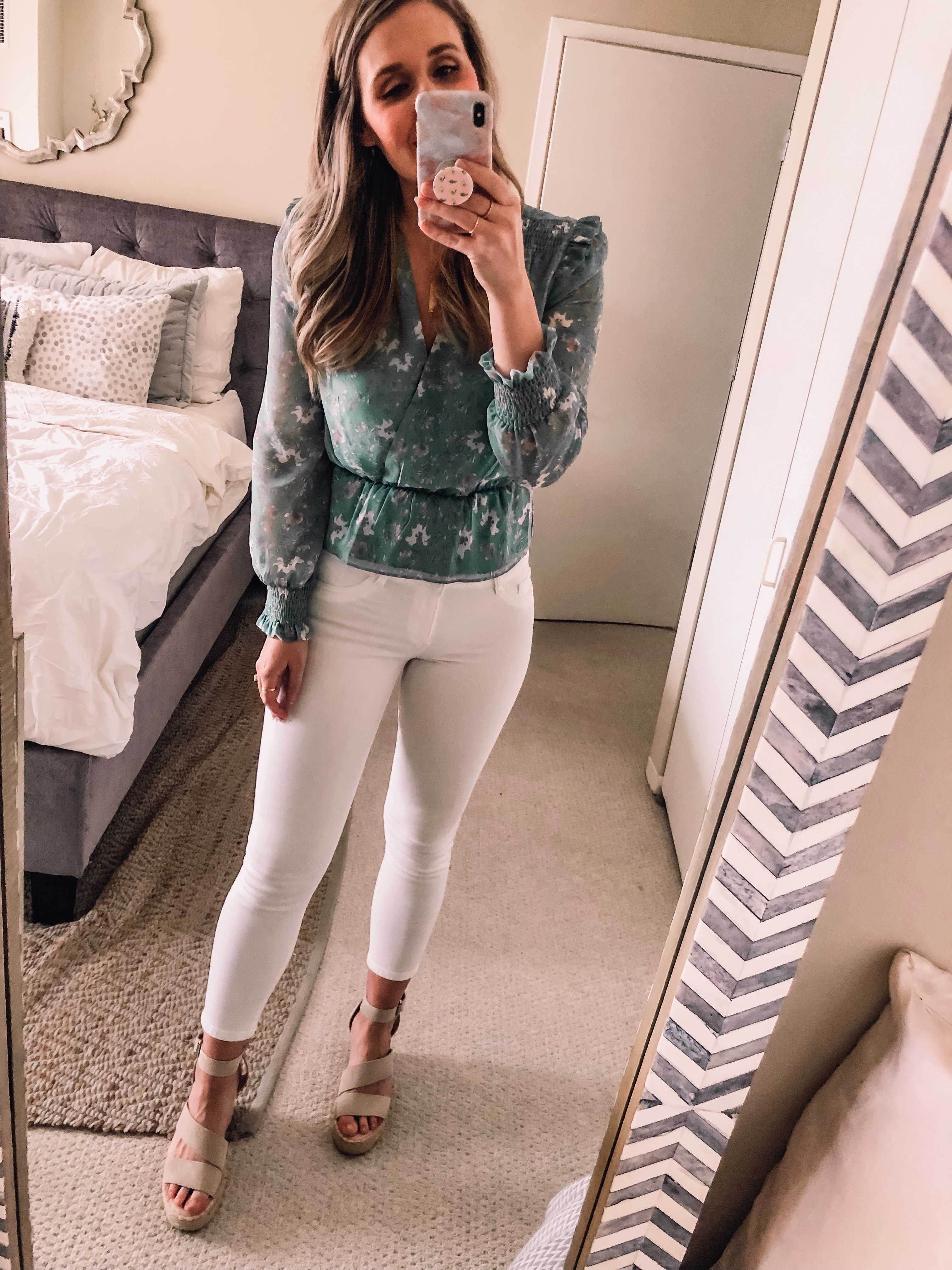 green floral top with white jeans 