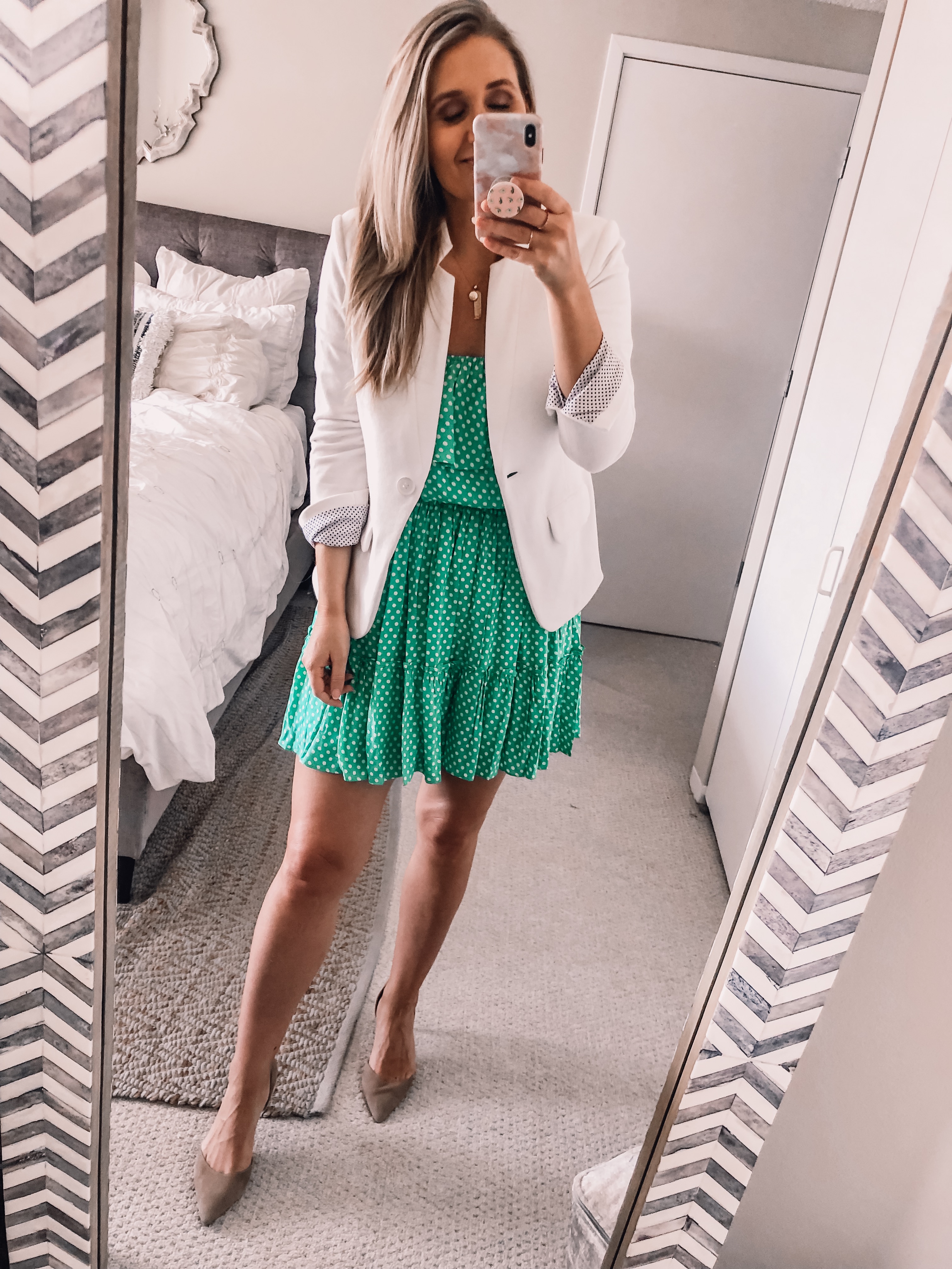 green wedding guest dress with a white blazer