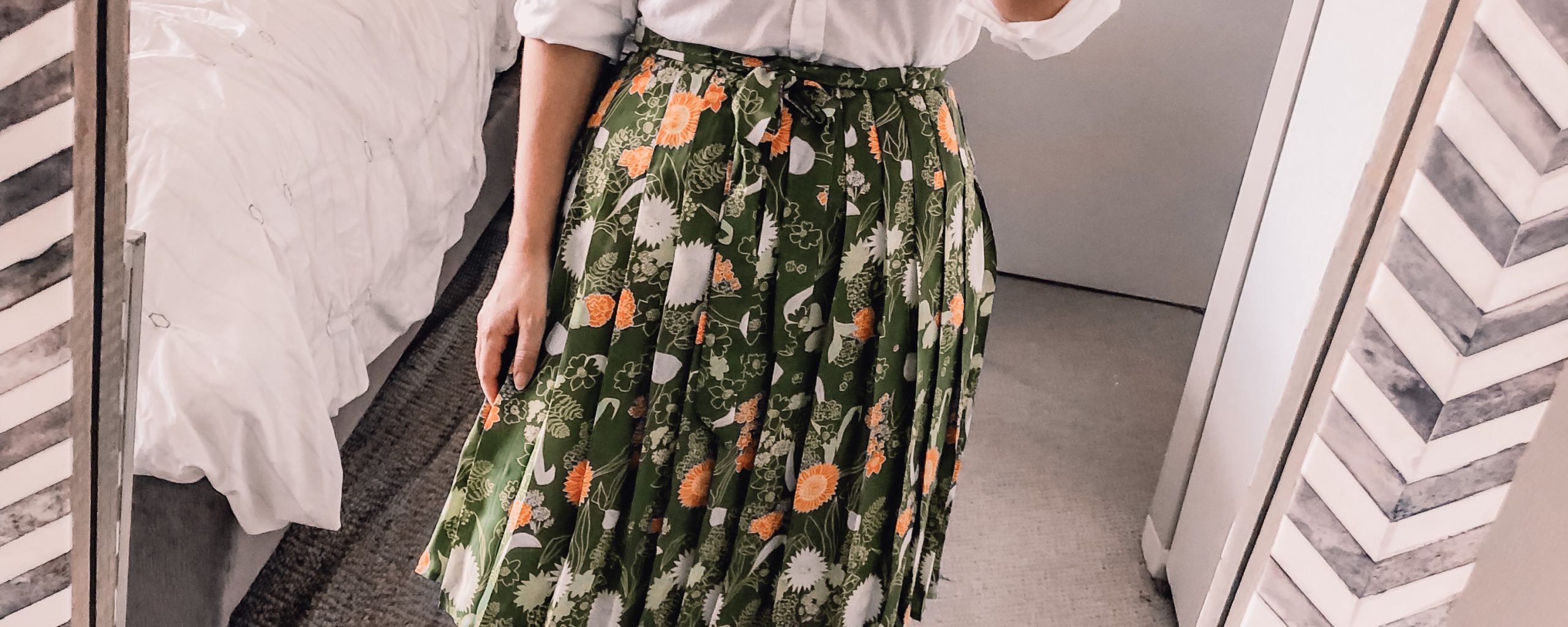 green pleated skirt from boden at nordstrom for an office outfit idea