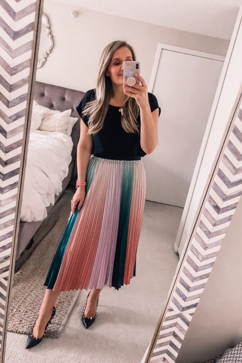 colorful pleated skirt and black blouse