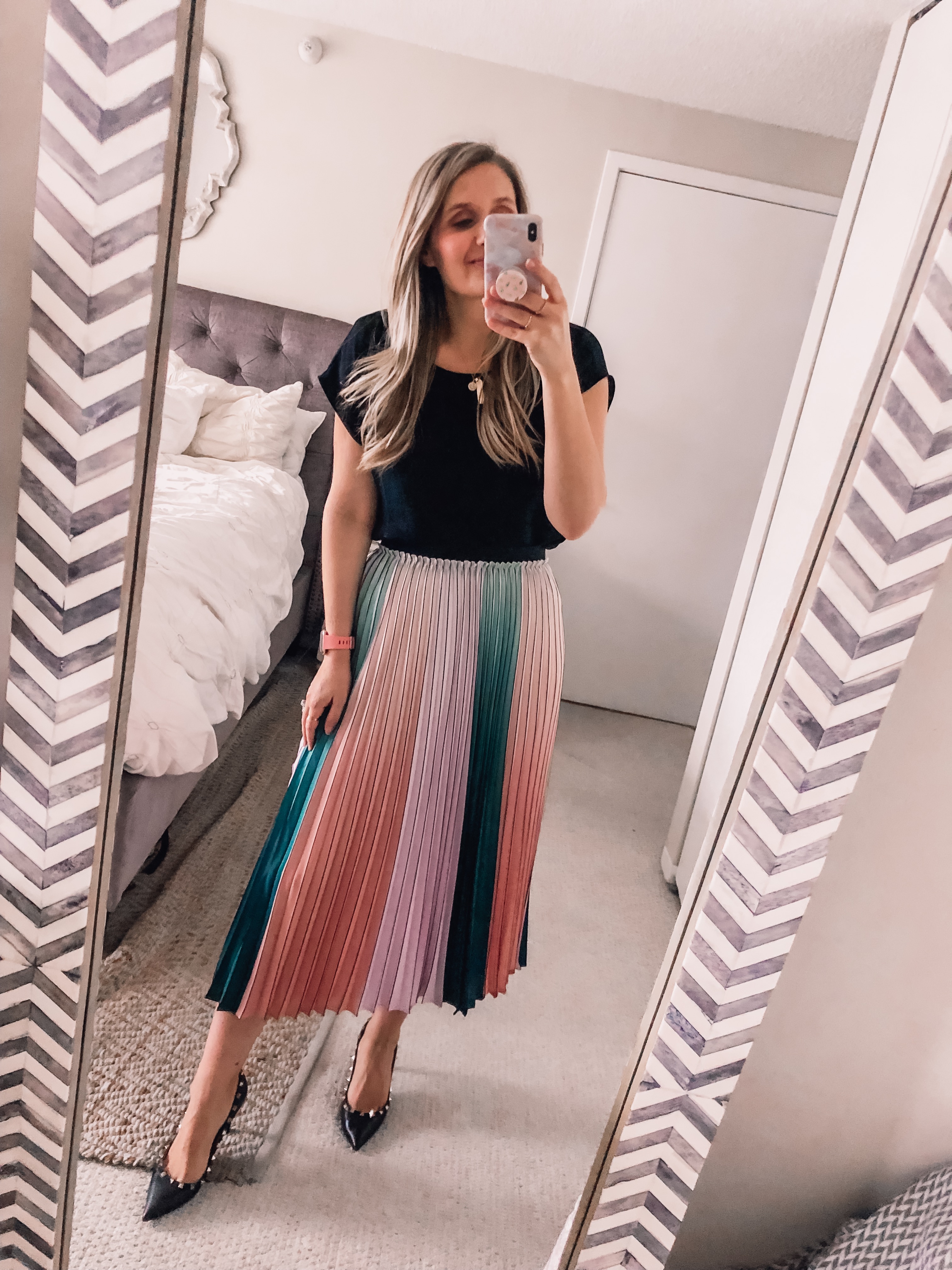 colorful pleated skirt and black blouse