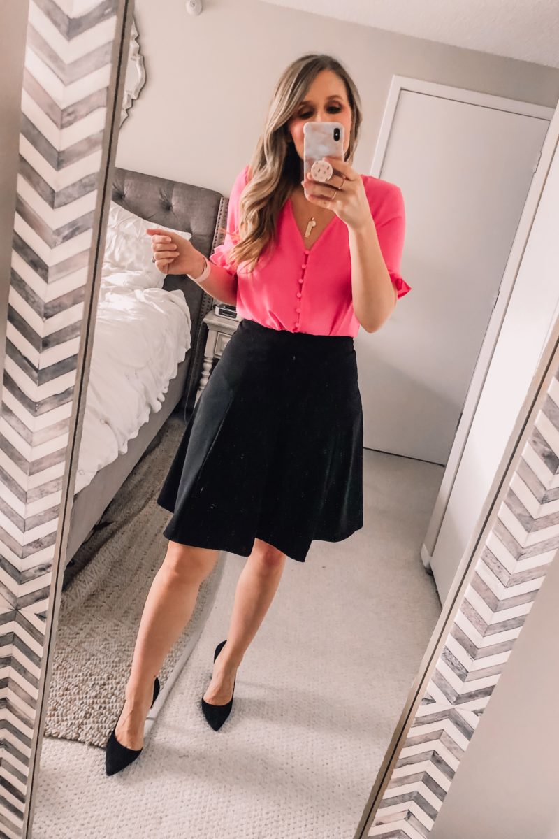 Pink button front top with a black a link business skirt