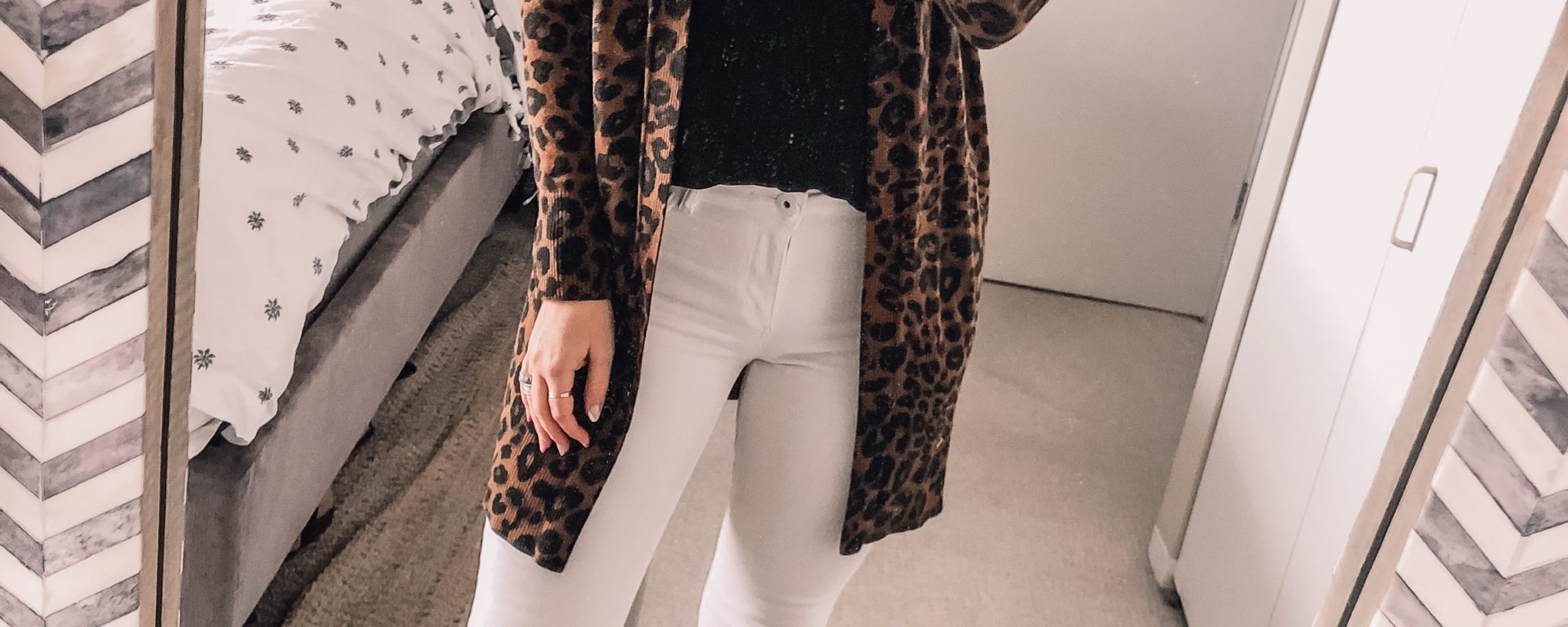 leopard cardigan with a black lace tank