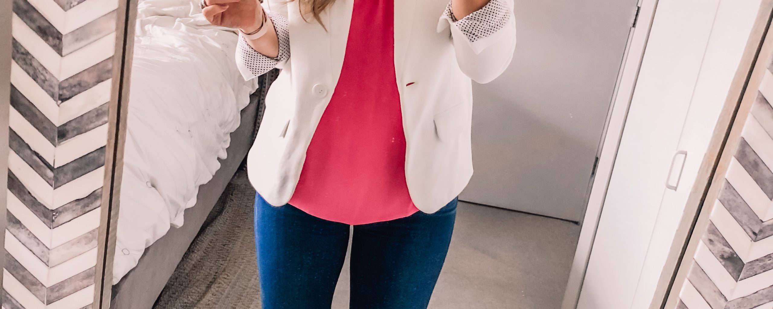 pink date night top and a white blazer