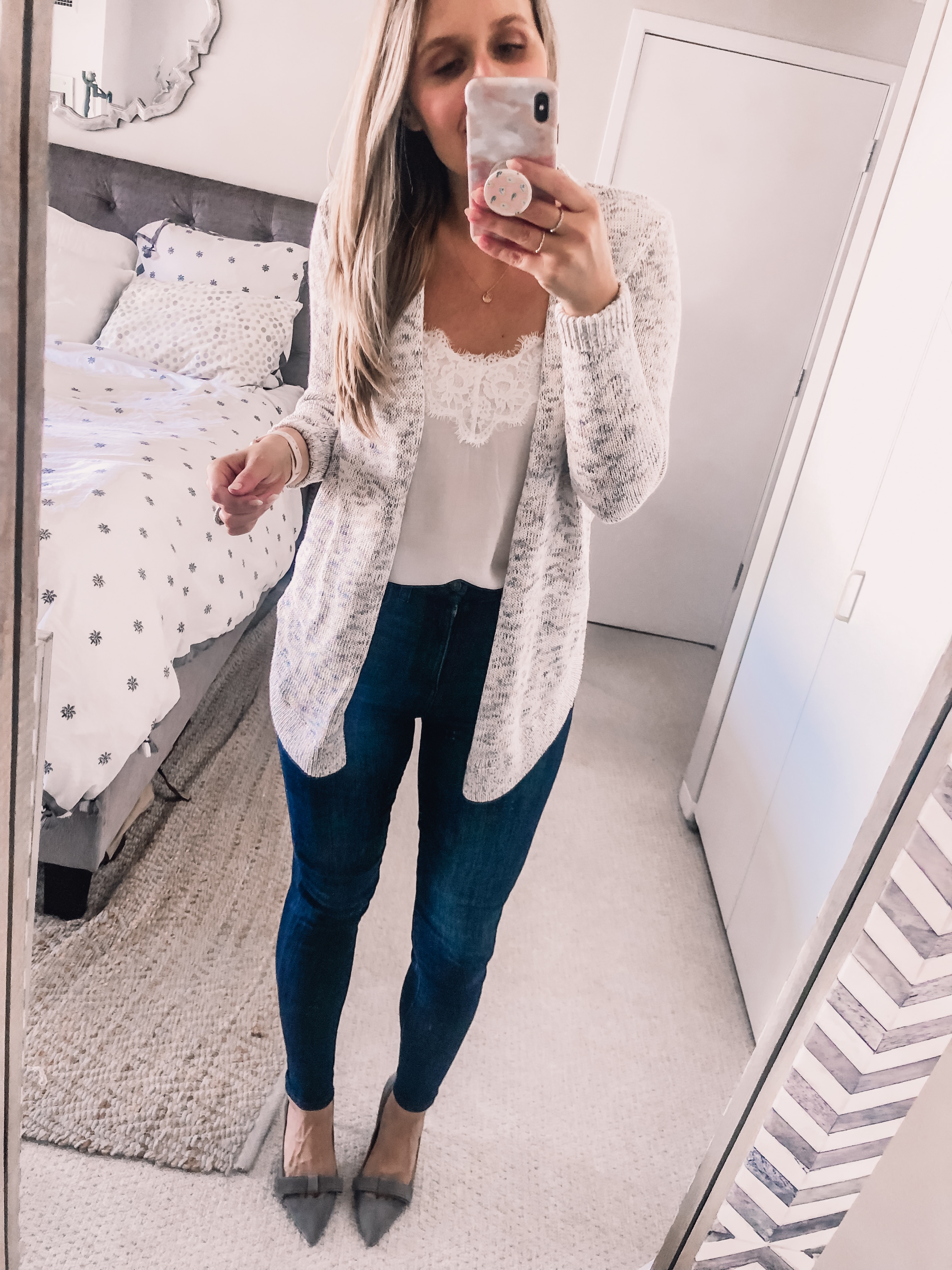 grey cardigan with a white lace top