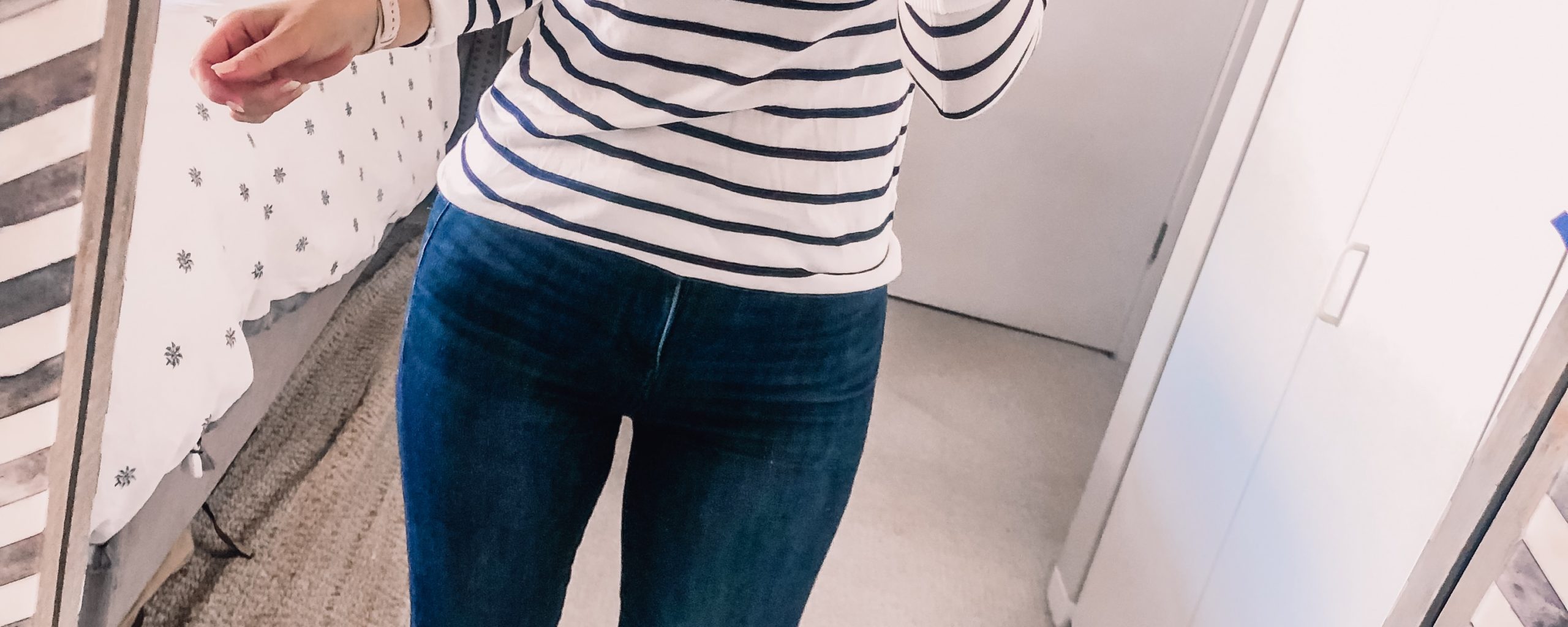 striped sweater and skinny jeans