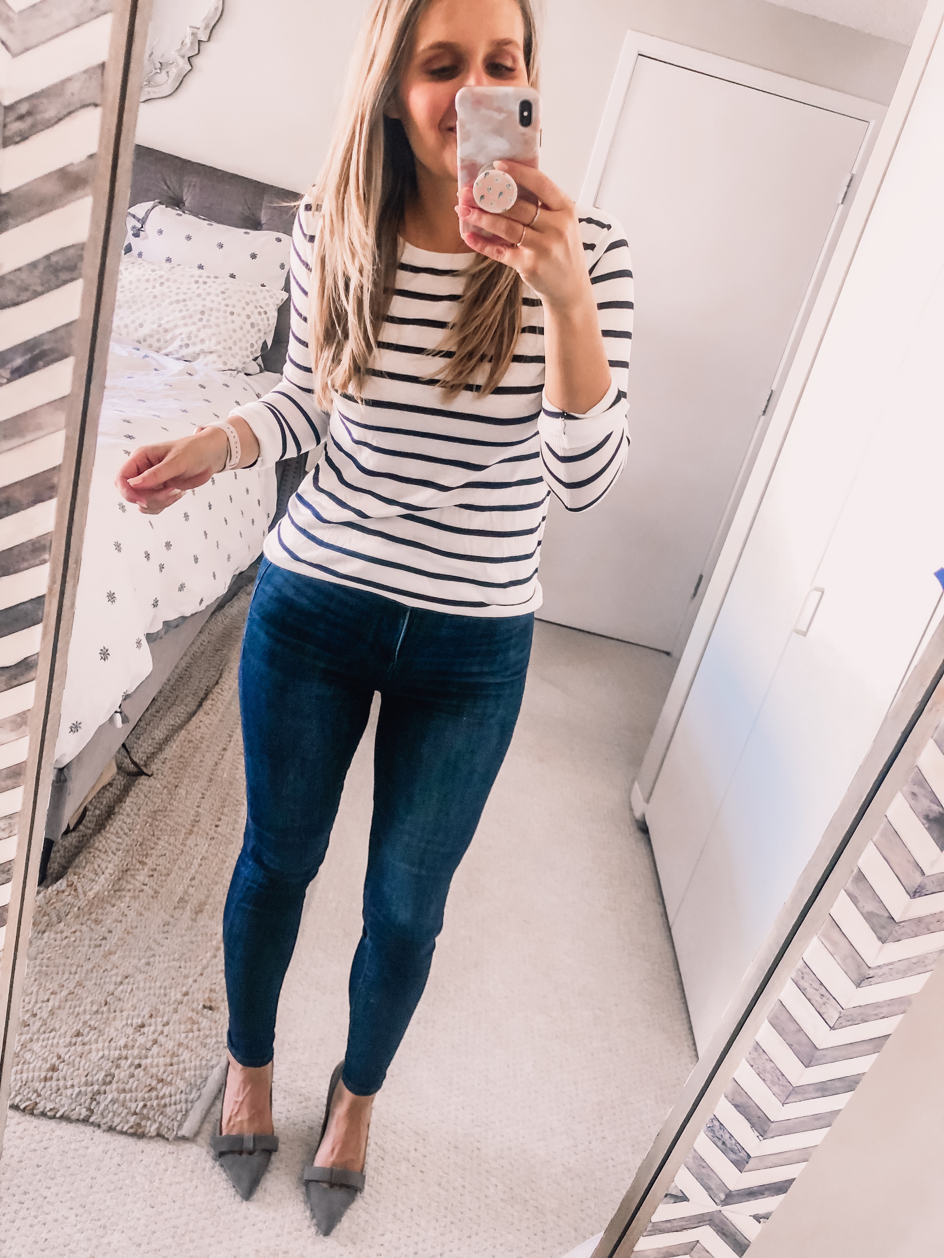 striped sweater and skinny jeans