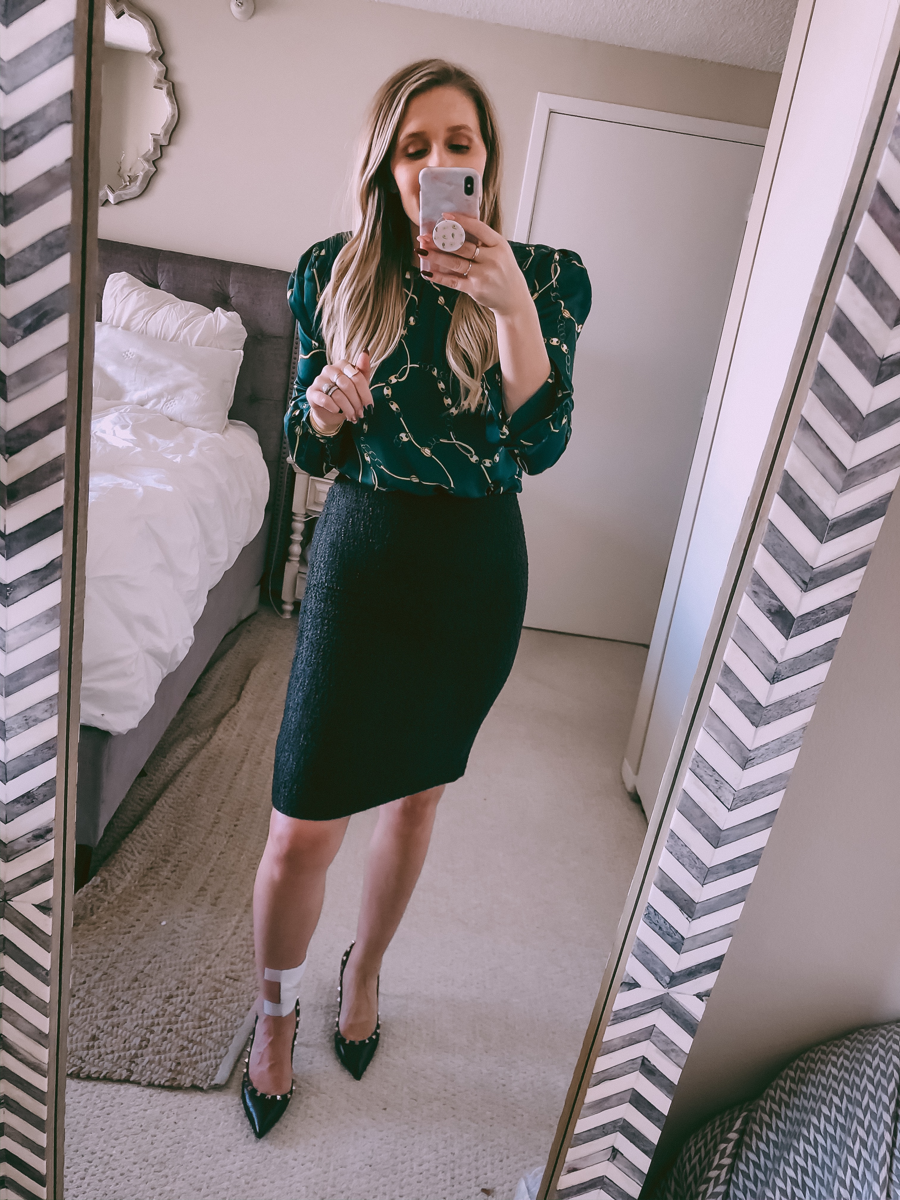 gold and green blouse with a black pencil skirt 