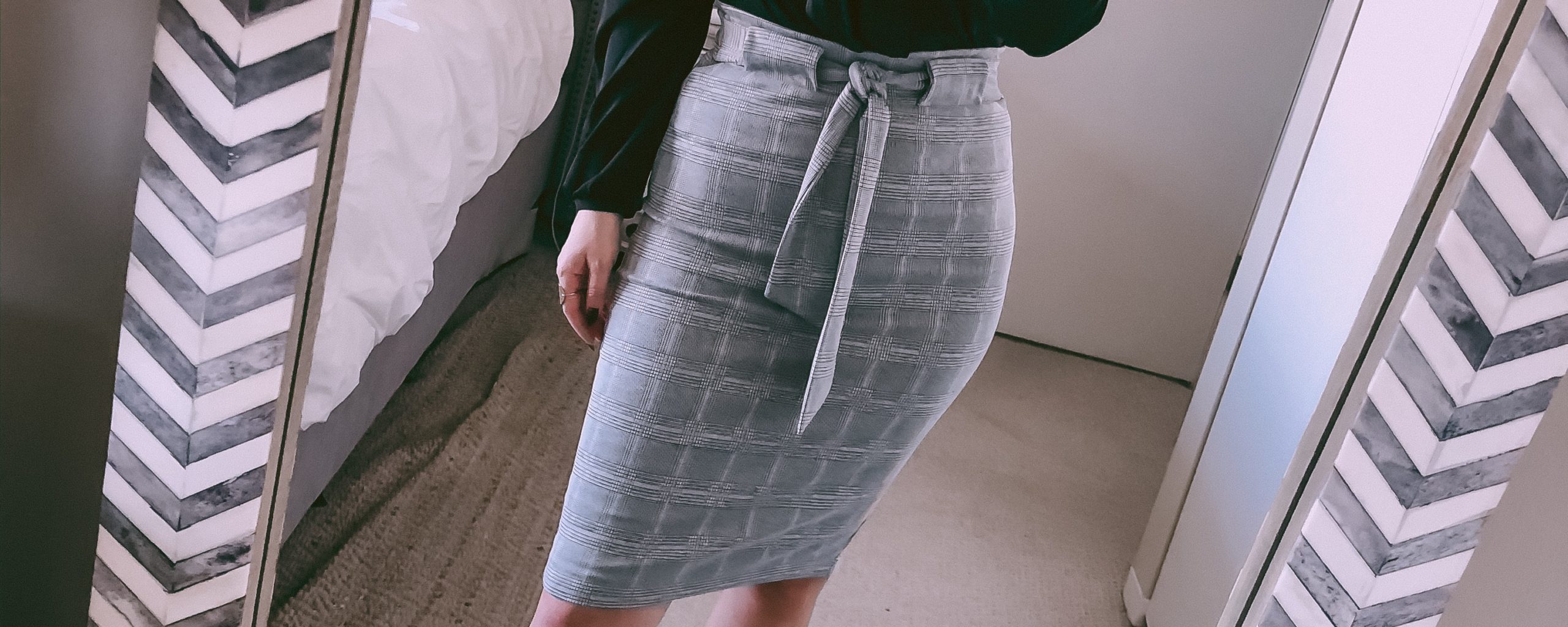 gray pencil skirt with a black blouse