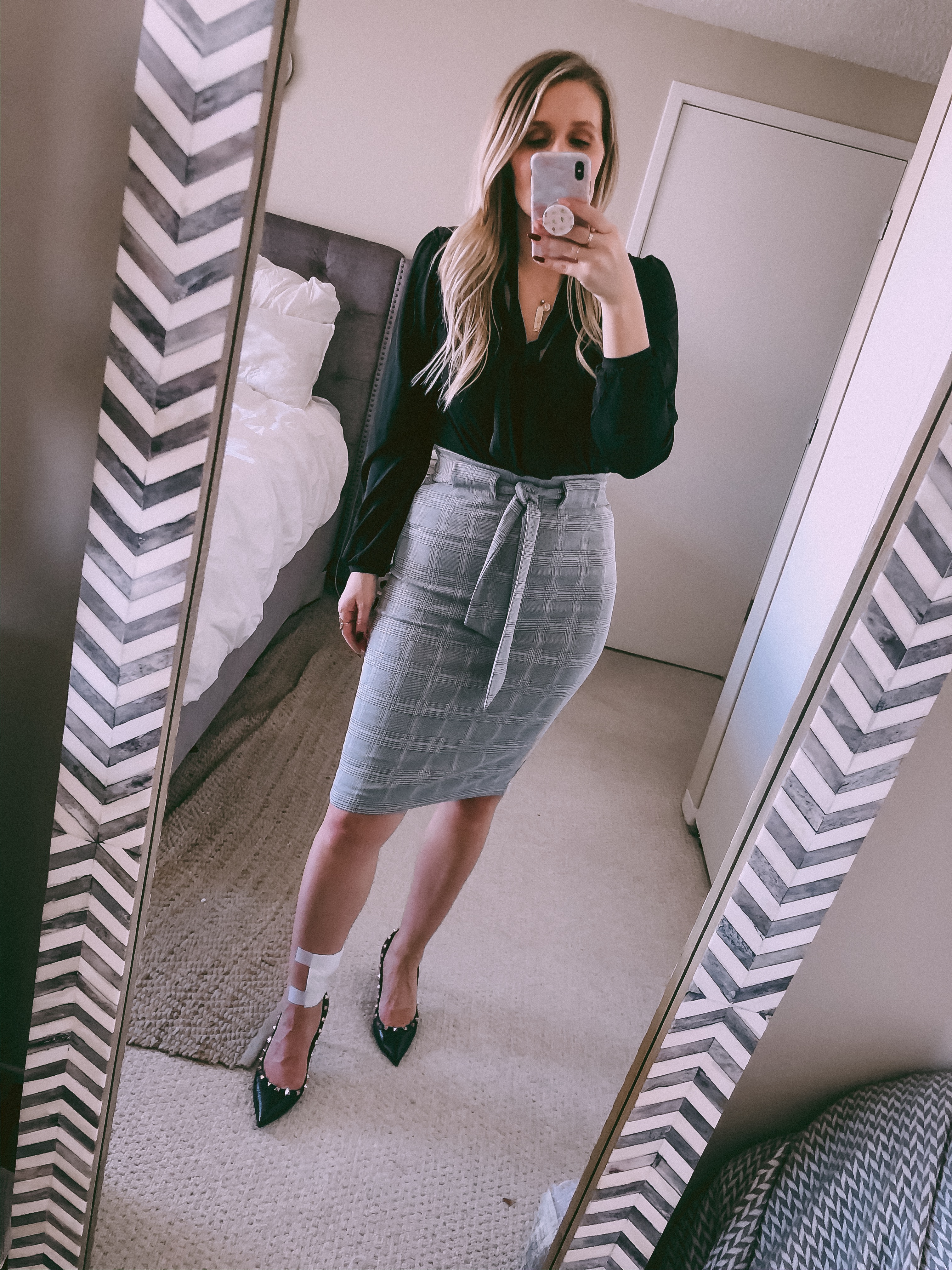 gray pencil skirt with a black blouse