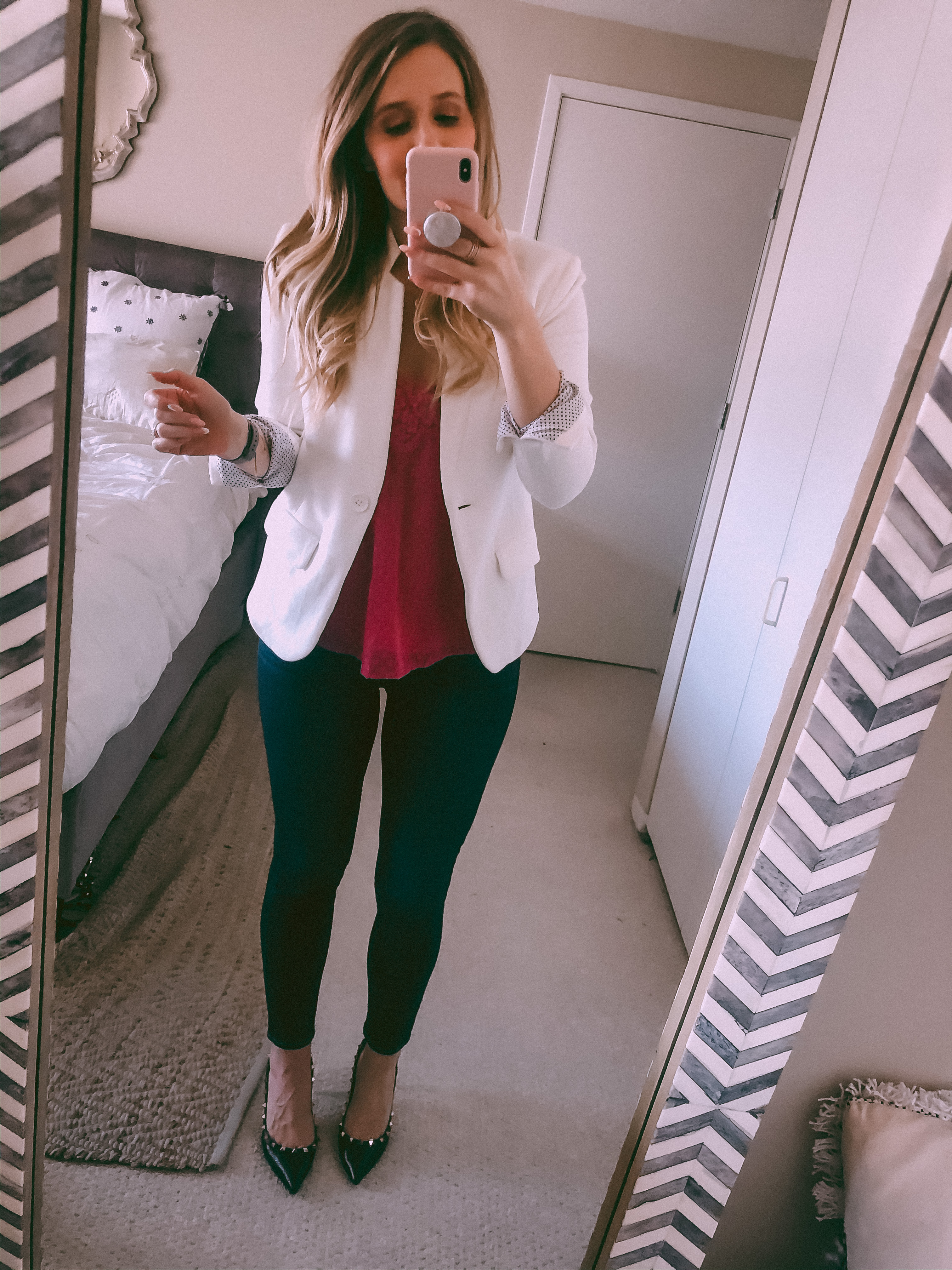 white blazer and a lace tank 