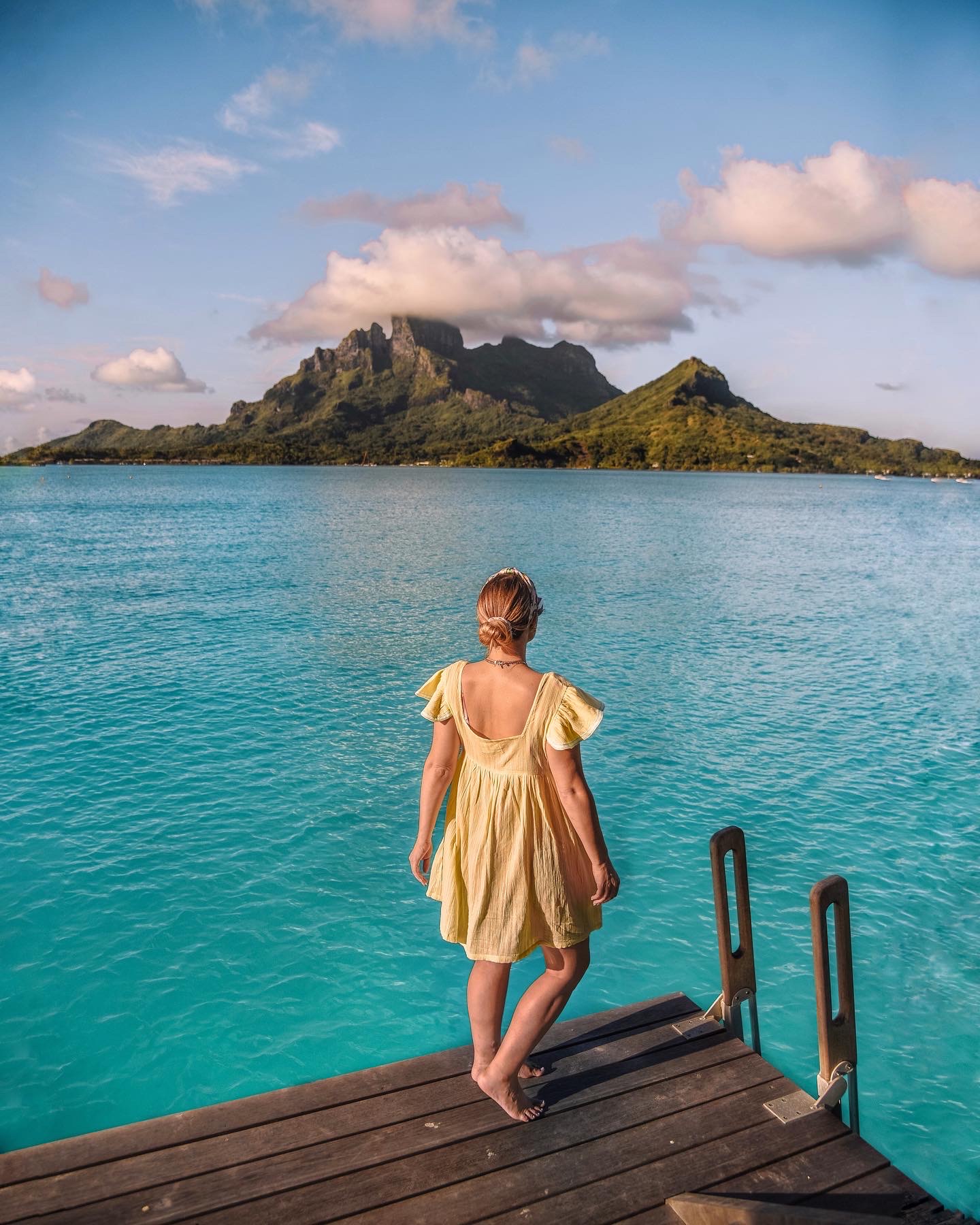 yellow ruffled dress for babymoon in bora bora